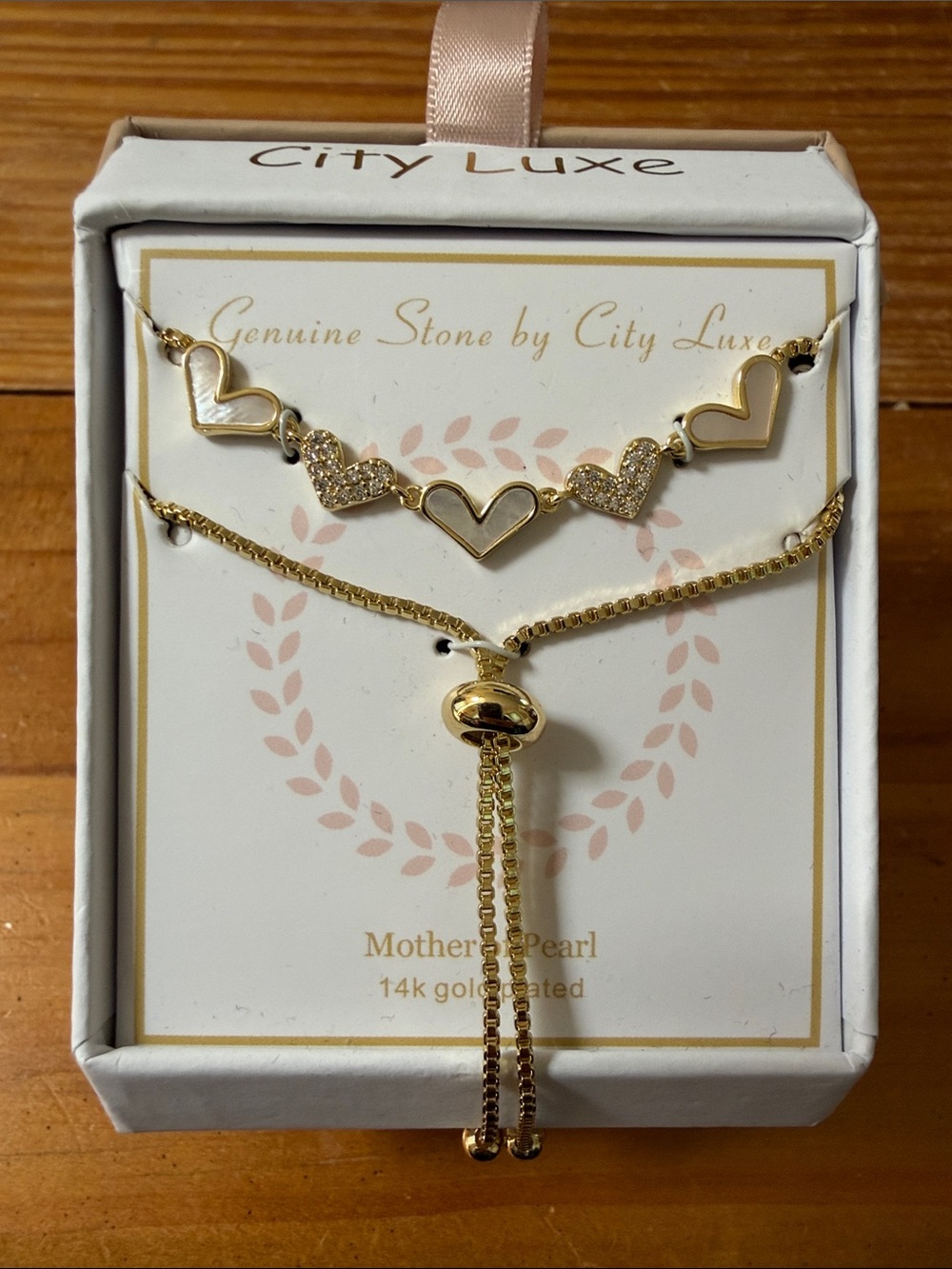 City Luxe mother-of-pearl and crystal heart adjustable gold tone bracelet